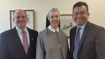 Sister Mary Margaret Ann of Catholic Distance University with Mark Moitoza, AMS Vice Chancellor, and Jose Amaya, AMS Director of Faith Formation, during a visit to the Cardinal O'Brien Pastoral Center.