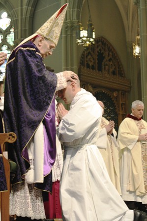 Most Reverend Roger J. Foys, D.D., Bishop of Covington, KY ordains Deacon William A. Appel to the Transitional Diaconate.