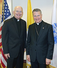 Father Robert R. Cannon, Ch, Col, USAF (left), newly announced Chancellor of the Archdiocese for the Military Services, USA, with Archbishop Timothy P. Broglio, March 11, 2016, in Washington, D.C.