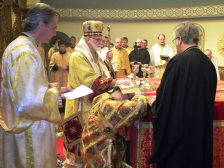 Bishop John Kurick ordains Kenneth Malley a transitional deacon Sunday, Sept. 22, in Parma, Ohio.