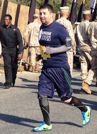AMS Assistant Director of Development Matthew Lockwood runs in Marine Corps Marathon Sunday, Oct. 27, 2013 in Washington, D.C.