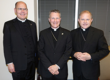 Left to right: Msgr. John J.M. Foster, J.C.D., Archbishop Timothy P. Broglio, J.C.D., and Auxiliary Bishop Robert J. Coyle on June 29, 2016, at the Edwin Cardinal O'Brien Pastoral Center in Washington, D.C.