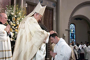 Bishop Douglas Deshotel ordains Rev. Mr. Rene Pellessier a Catholic transitional deacon Saturday, May 28, in Lafayette, La.