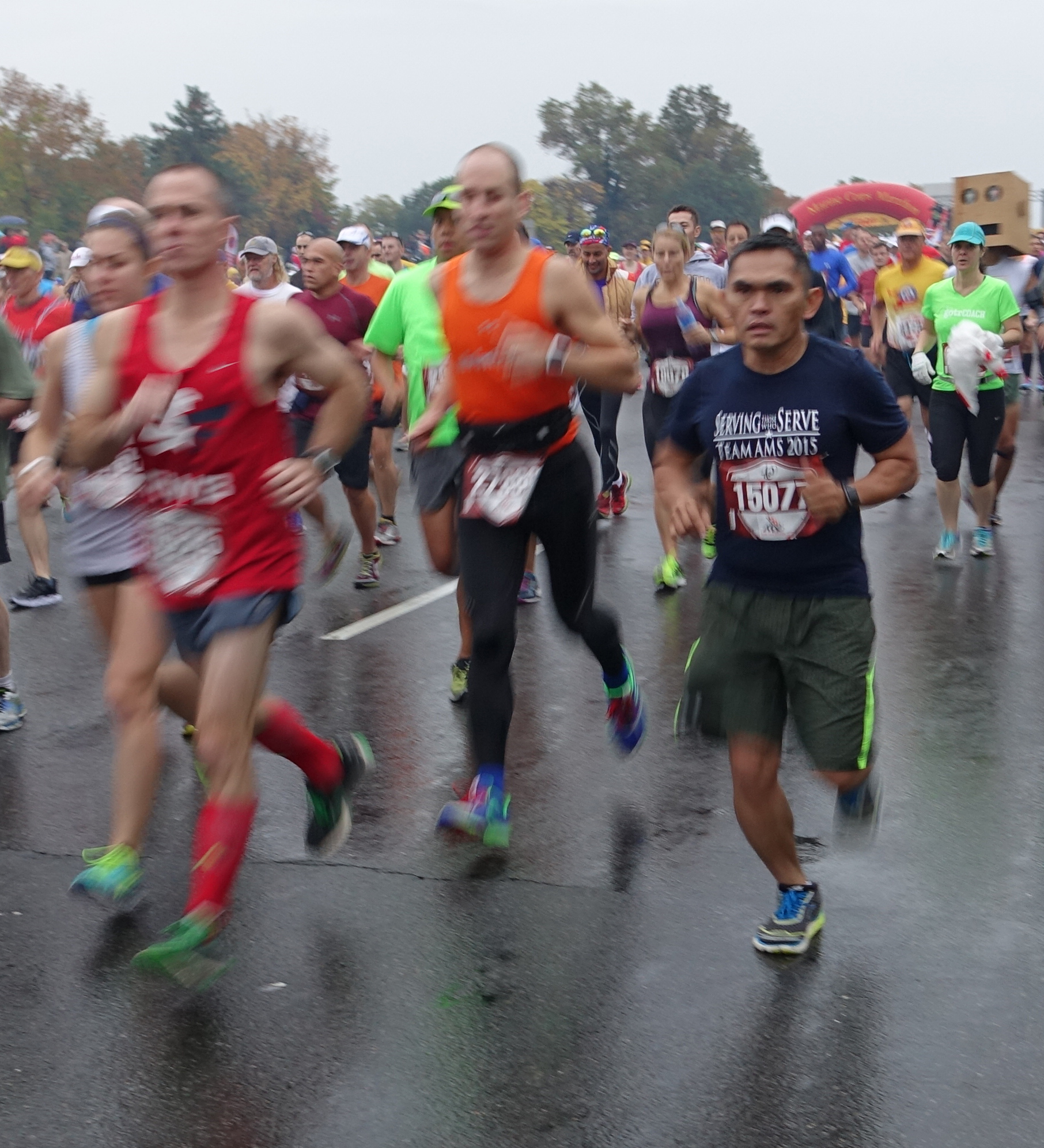 Father Arnel Ranada (Right), CH (CPT), USA, leaves the starting line on the 40th Annual Marine Corps Marathon in Arlington, Va., on Oct. 25, 2015.