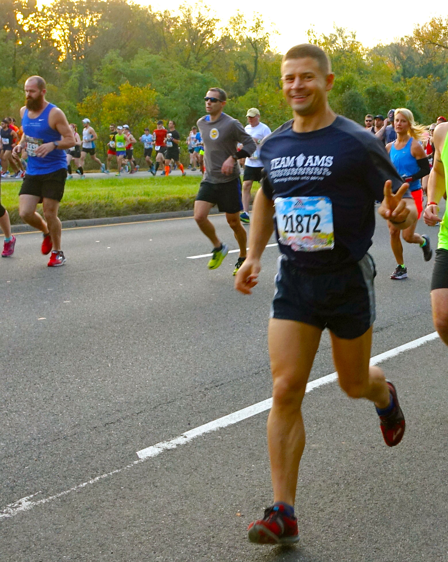 Father Luke Willenberg, CH (CPT), USA, led Team AMS across the finish line in the 41st annual Marine Corps Marathon on Oct. 30, 2016, in the nation’s capital.